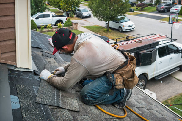 Professional Roof Replacement technician working in Doylestown, WI